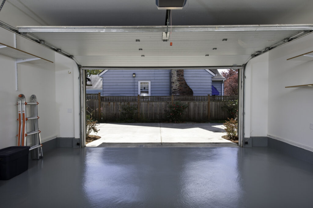 Interior of a clean garage in a house.