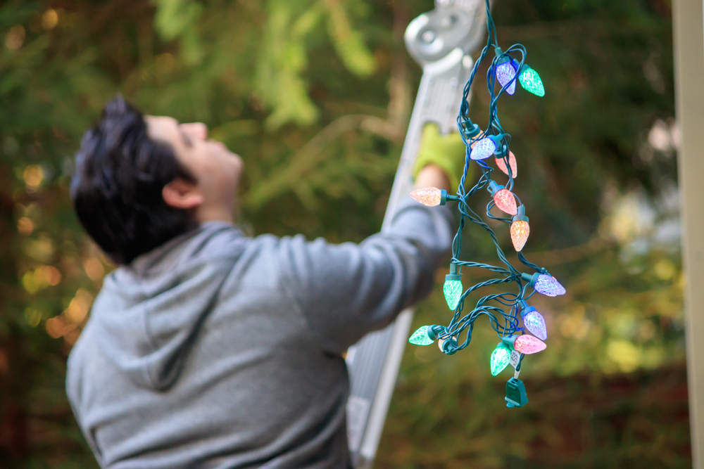 How to Hang Christmas lights around your garage door American Garage Door 