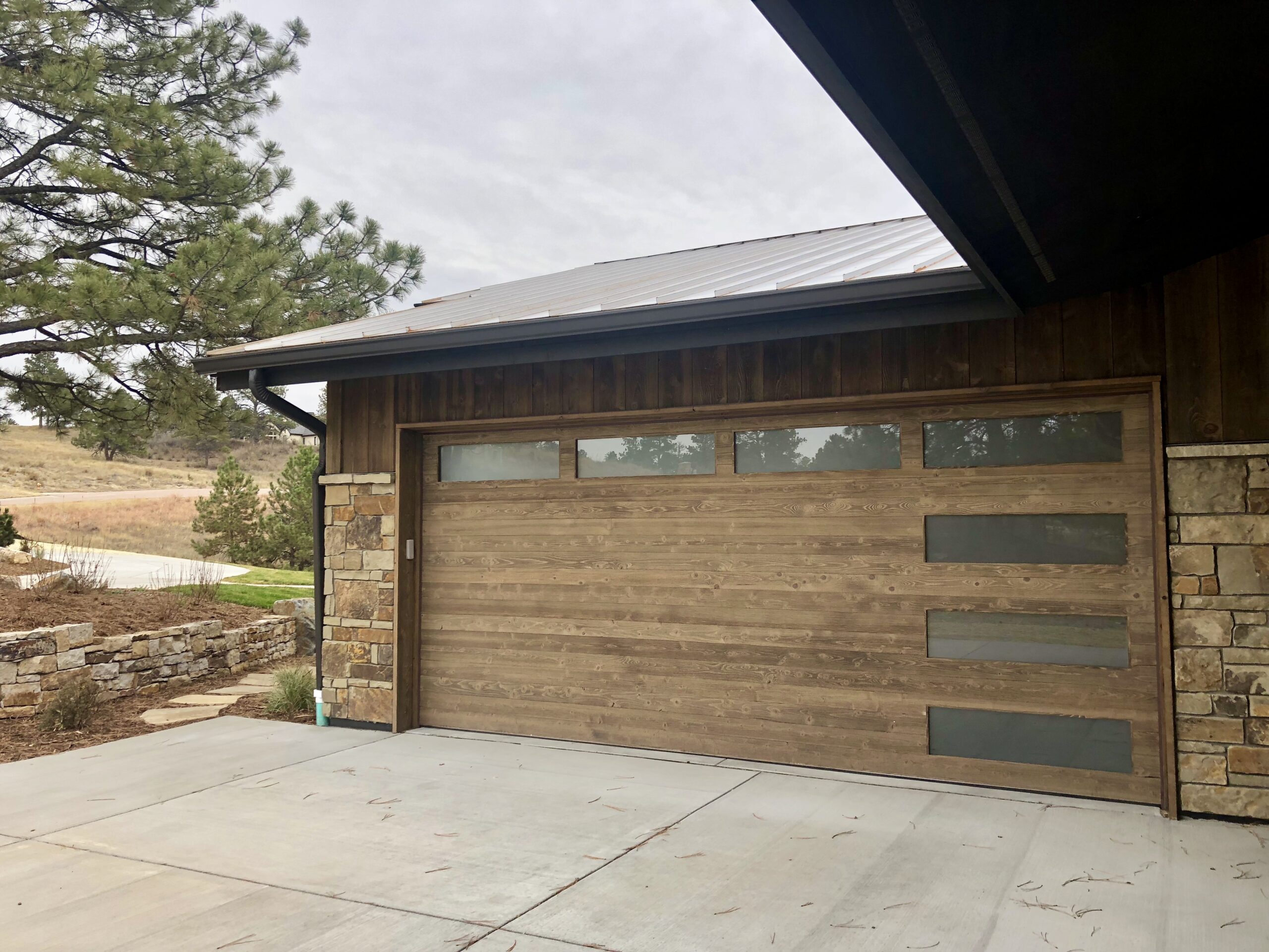 wood vs faux wood garage door