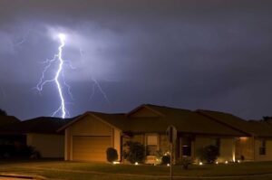 garage with stormy skin in background