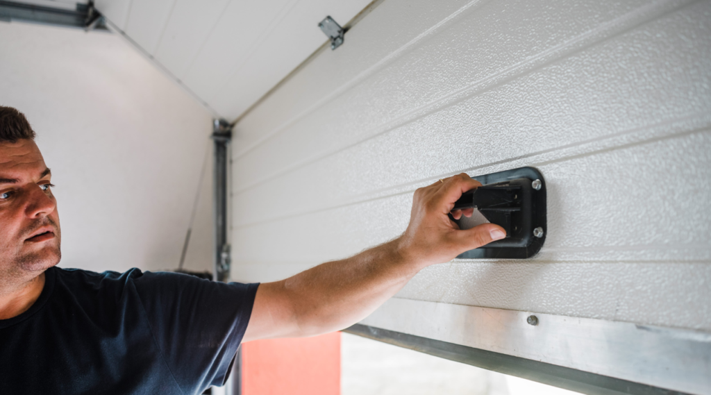 Man Trying to Open Garage Door - Which Types of Garage Door Damage Can Be Repaired?