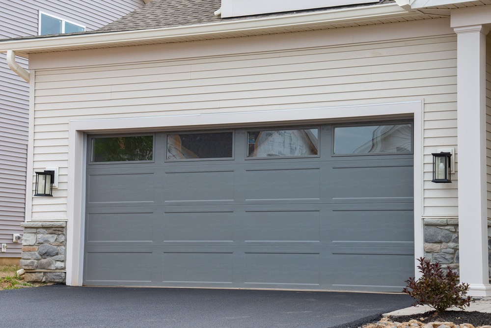 Safety First: Tips for a Secure Garage Door Window Replacement