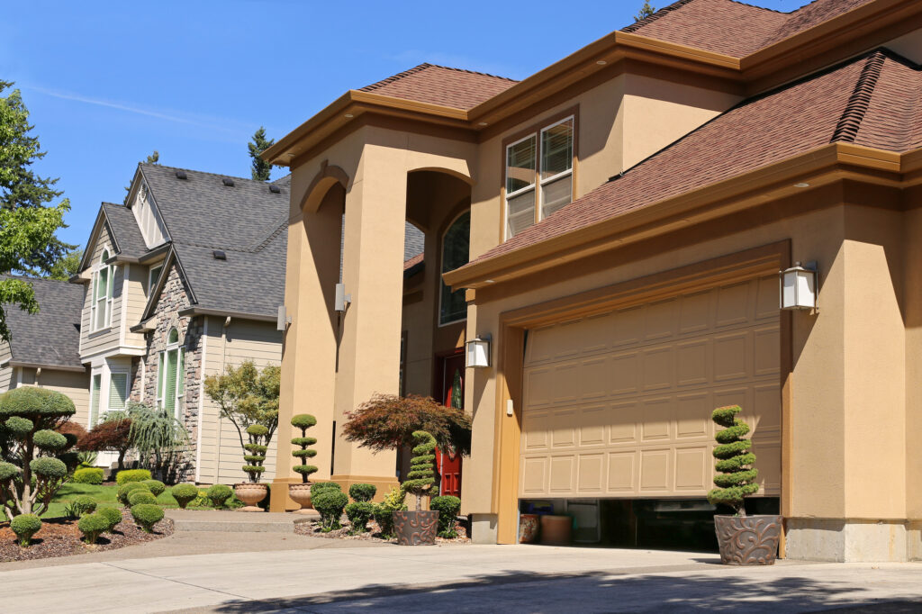 House with garage door sensor light