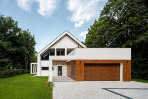 exterior of nice home with wooden garage door