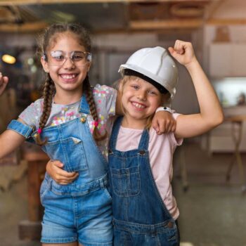 Kids playing in garage during summer.