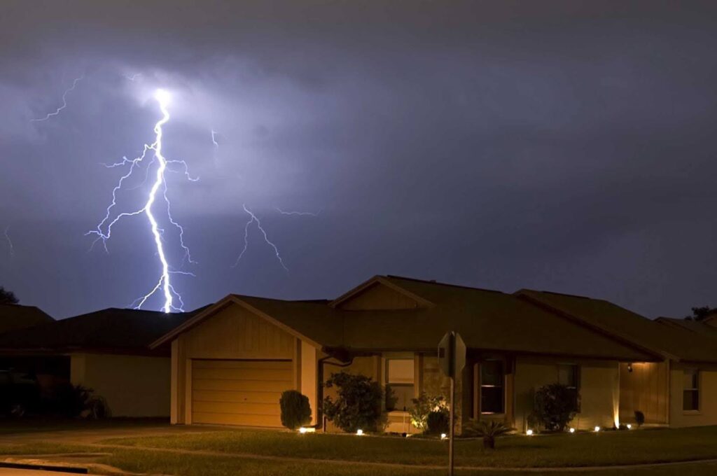 garage with stormy skin in background